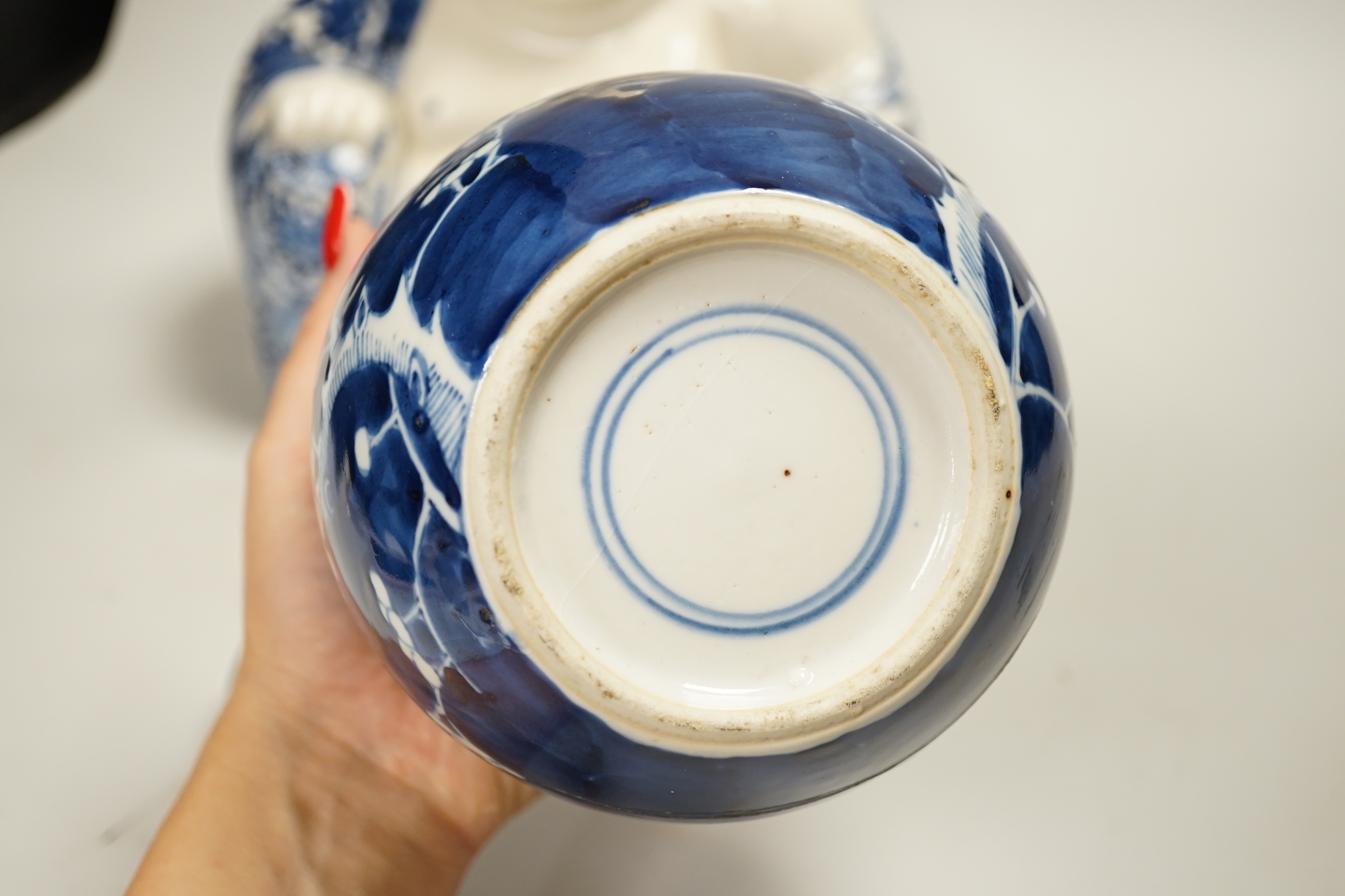 Chinese ceramics including a Buddha, prunus flower ginger jar and plates, the largest 26cm high